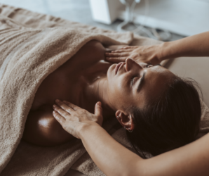 Person receiving table massage in their hotel room